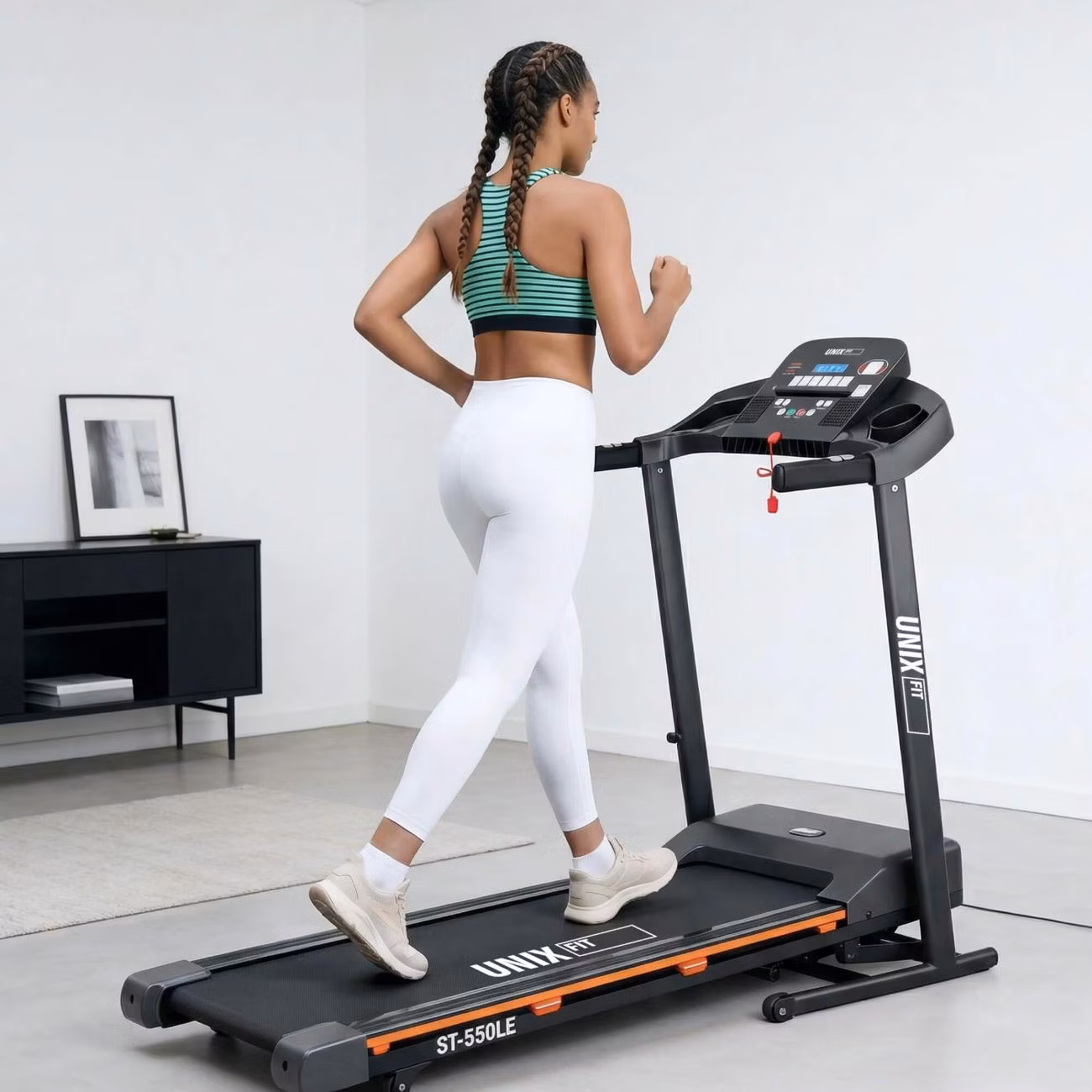 Беговая дорожка для дома UnixFit ST-550LE складная, пиковая мощность 2.0 л.с, до 120 кг, беговое полотно 120x42 см, скорость 0.8 - 12 км/ч, угол наклона 0-15 %