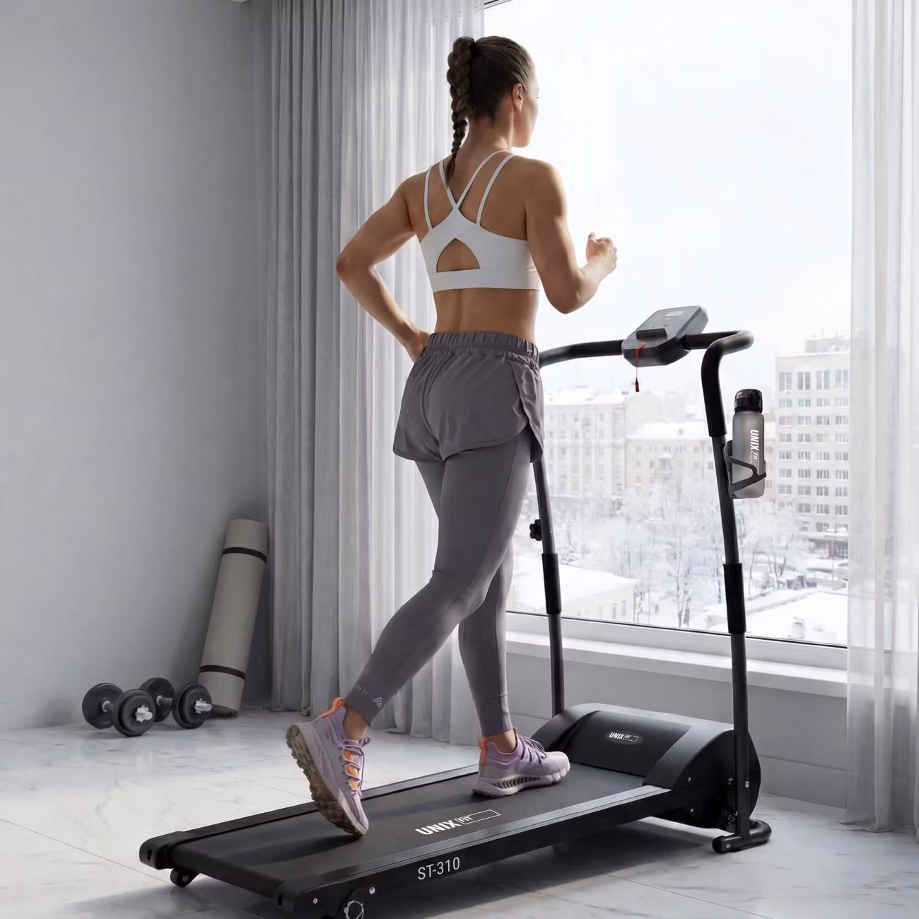 Беговая дорожка для дома UnixFit ST-310 складная, пиковая мощность 1,5 л. с, до 100 кг, беговое полотно 100x30 см, скорость 1 - 9 км/ч, угол наклона 0-10%